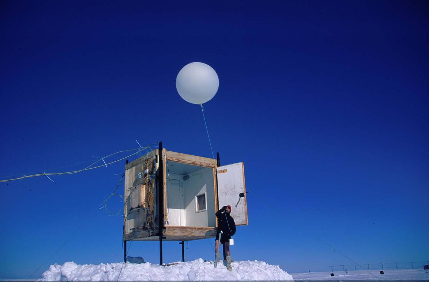 The Halley Met balloon shed with a baloon being launched