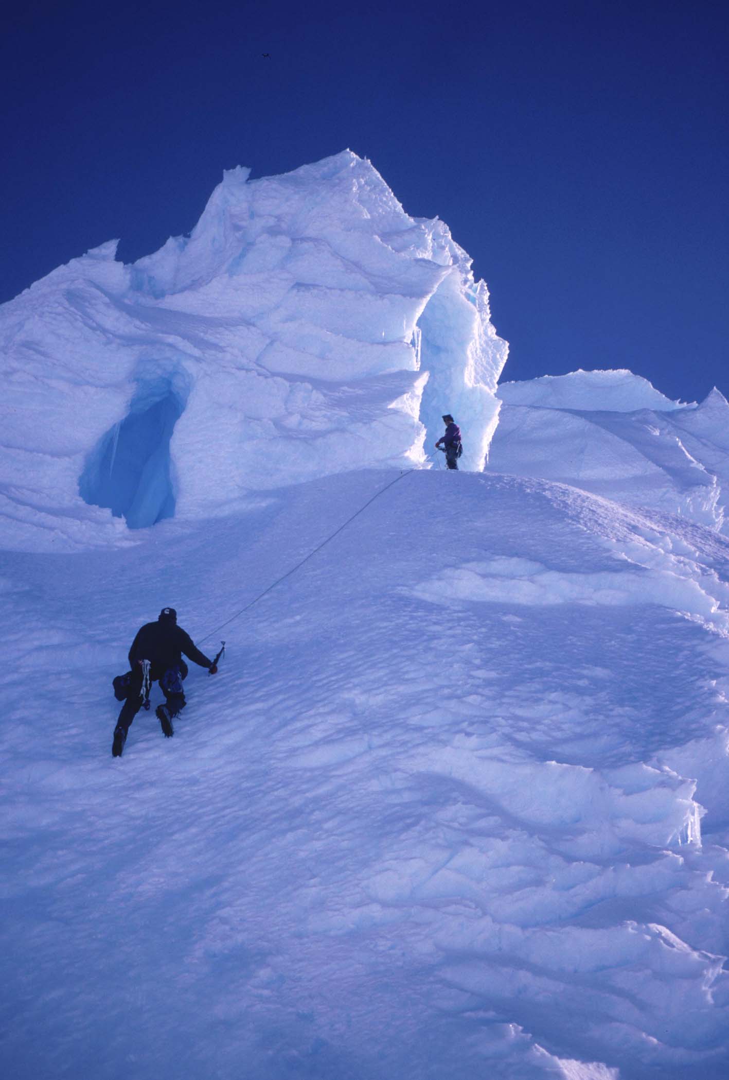 Climbing an ice cliff in Antarctica